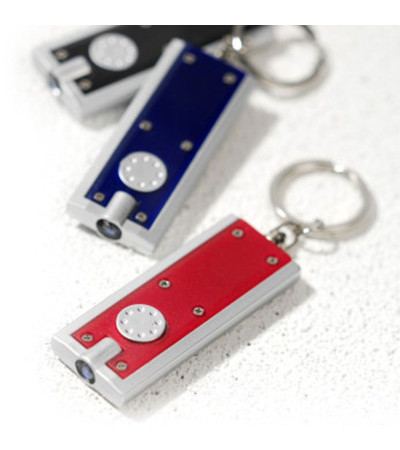 Брелок-фонарик прямоугольной формы из пластика в цветном корпусе 951992 под логотип